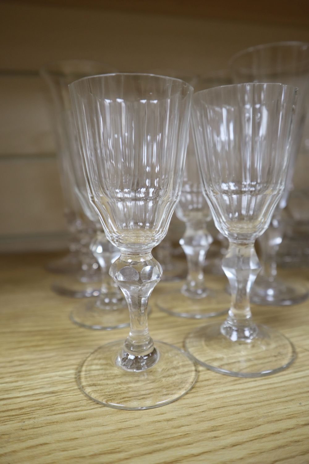 A group of four mid 19th century glass rummers, various cut glass champagne flutes etc.